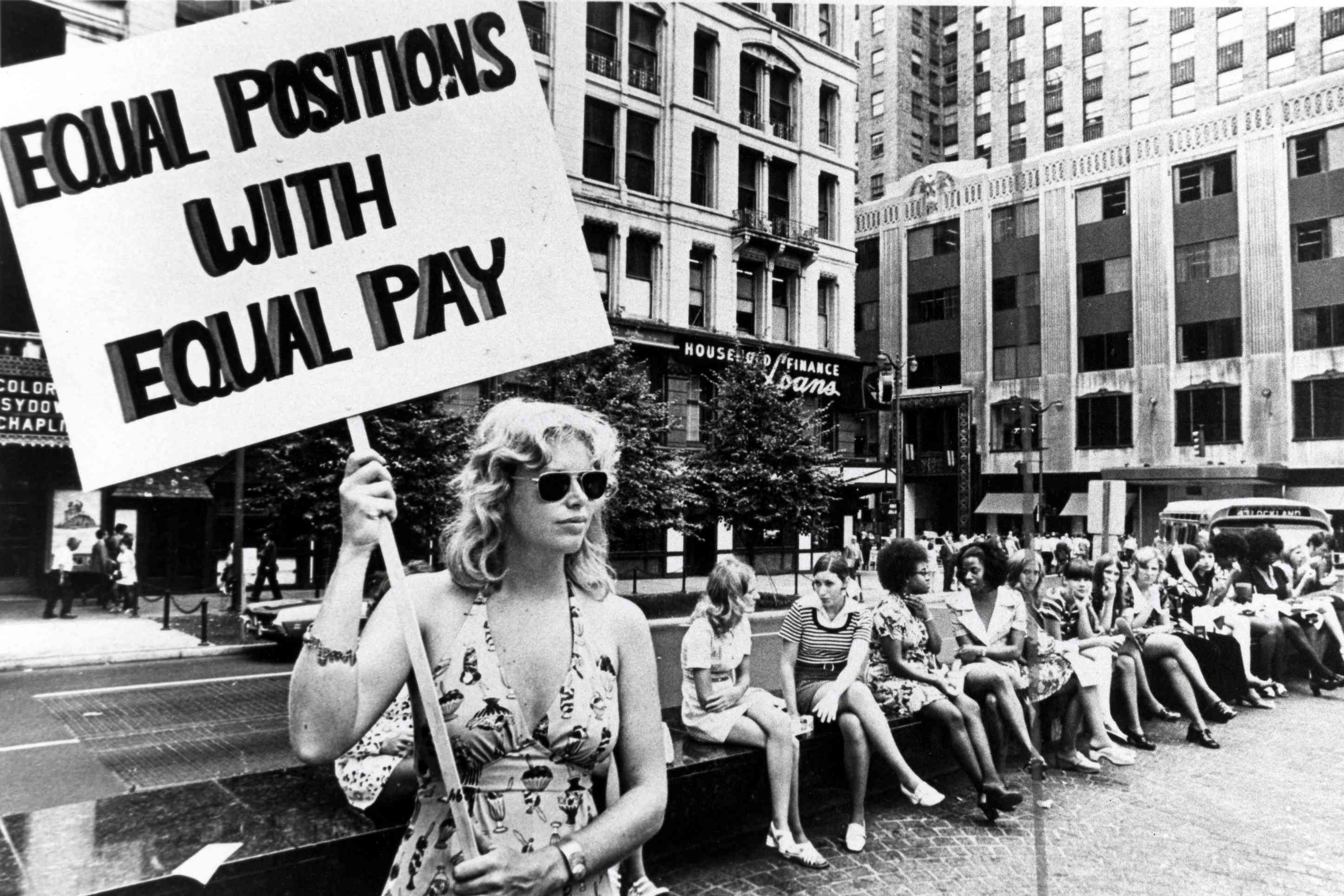 Woman demonstrating for equal pay in Cincinnati