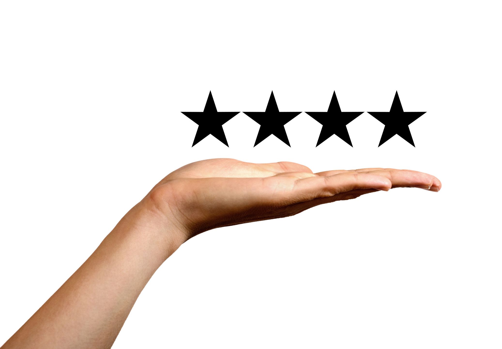 Open palm of a hand presenting four stars