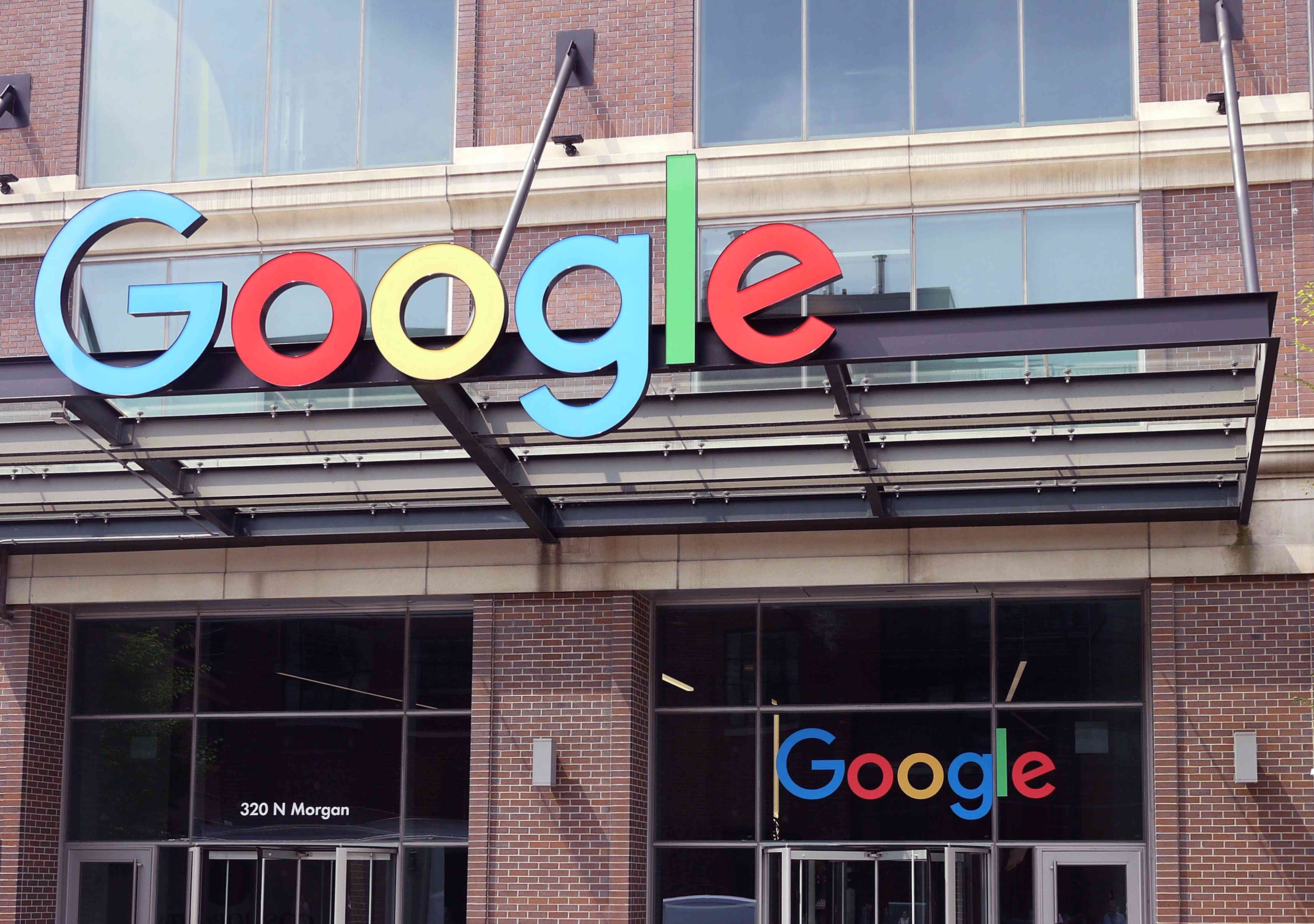 Google company logo on the awning of a building (at 320 North Morgan Street) in the West Loop neighborhood, Chicago, Illinois, April 2018.