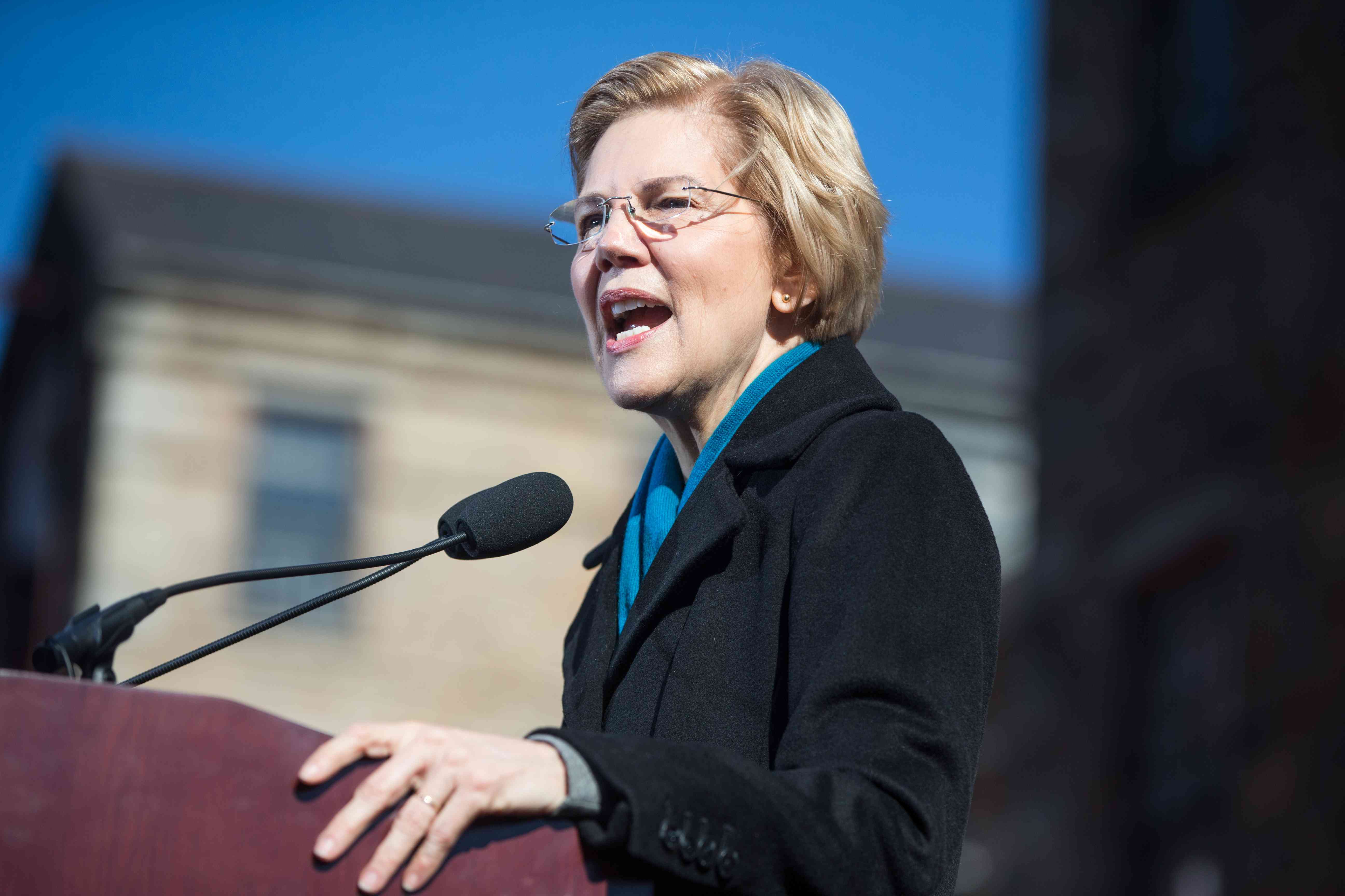 Senator Warren speaking at a podium