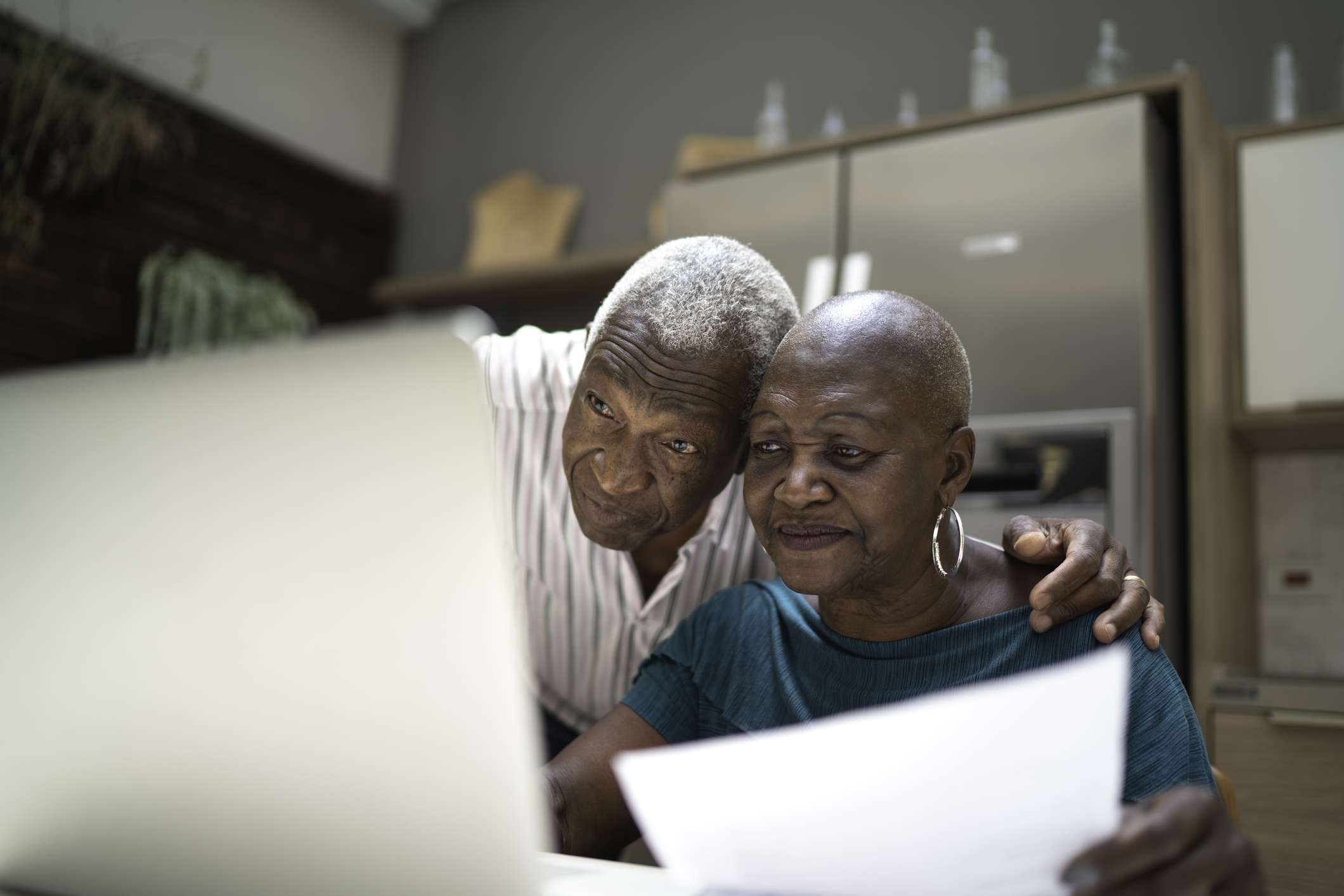 Senior couple doing home finances.