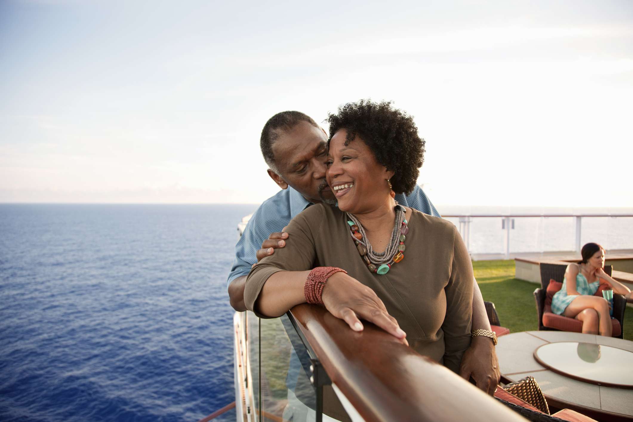 A retired couple on the deck of a cruise ship