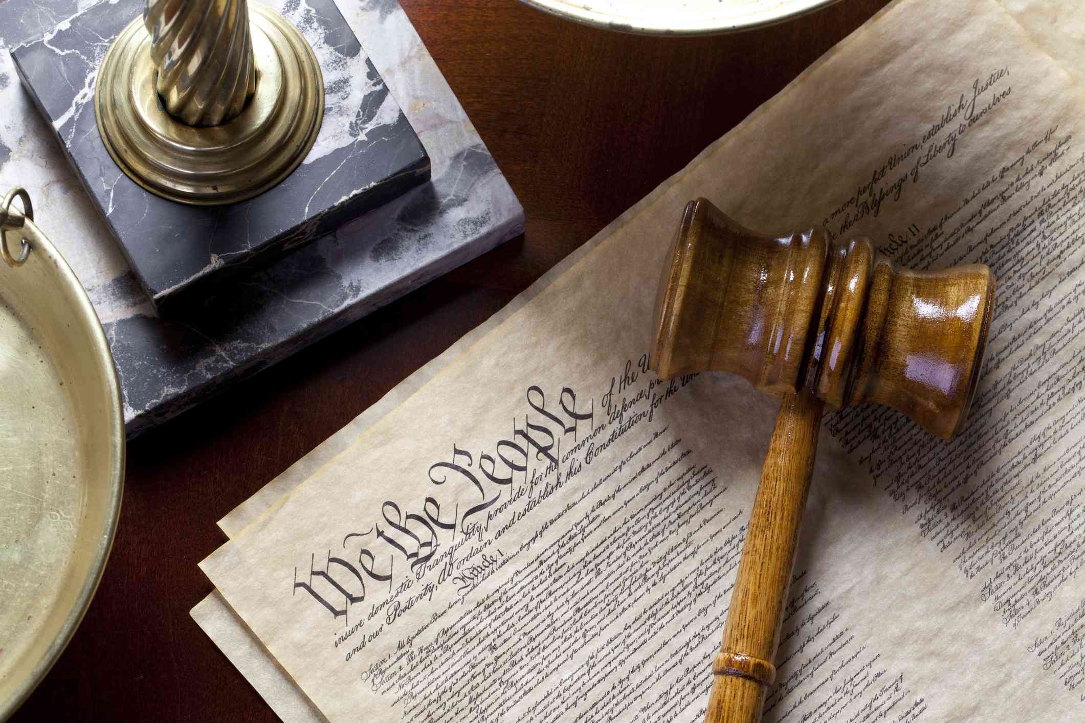 US Constitution with scales of justice and gavel