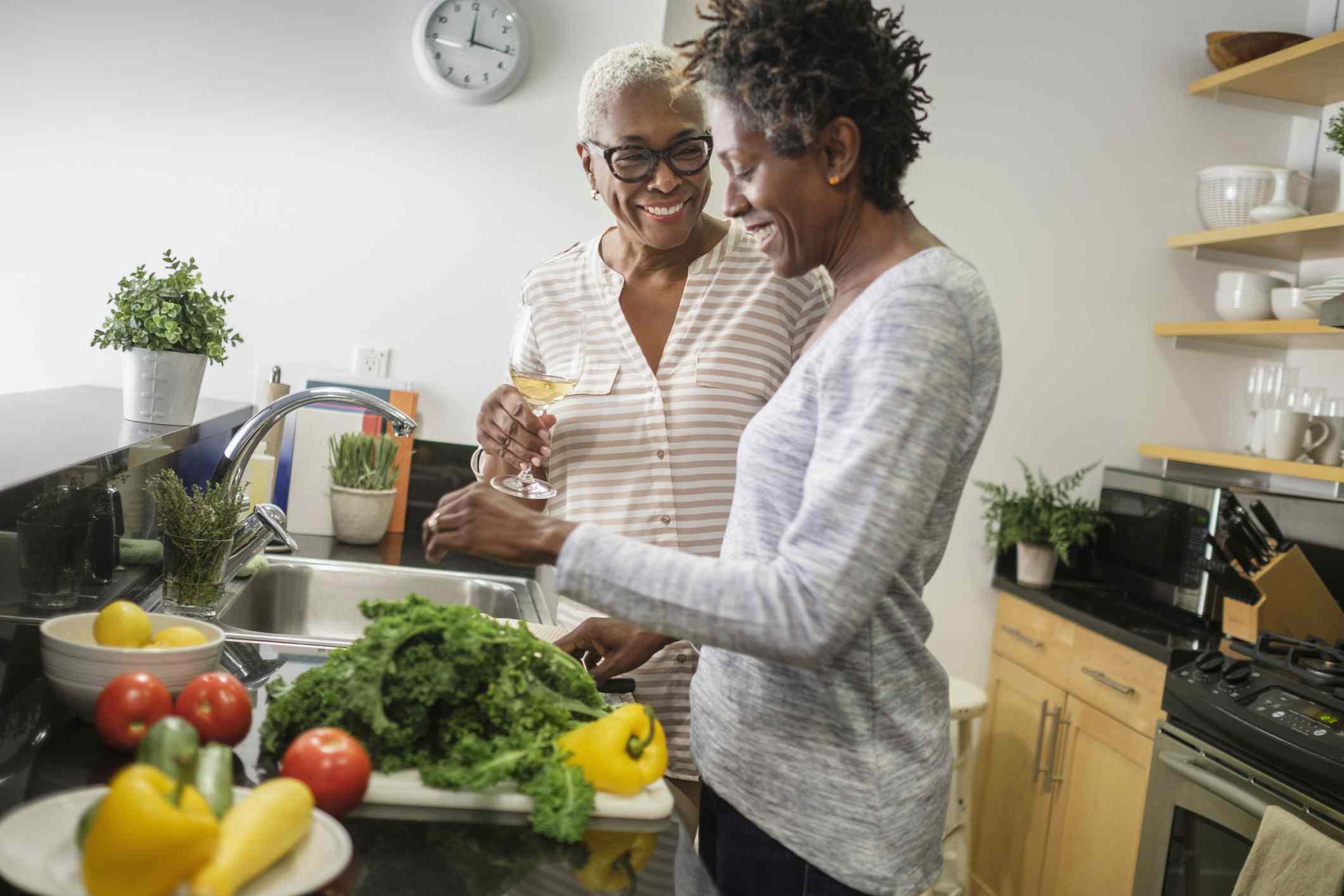 Two Black women cooking together