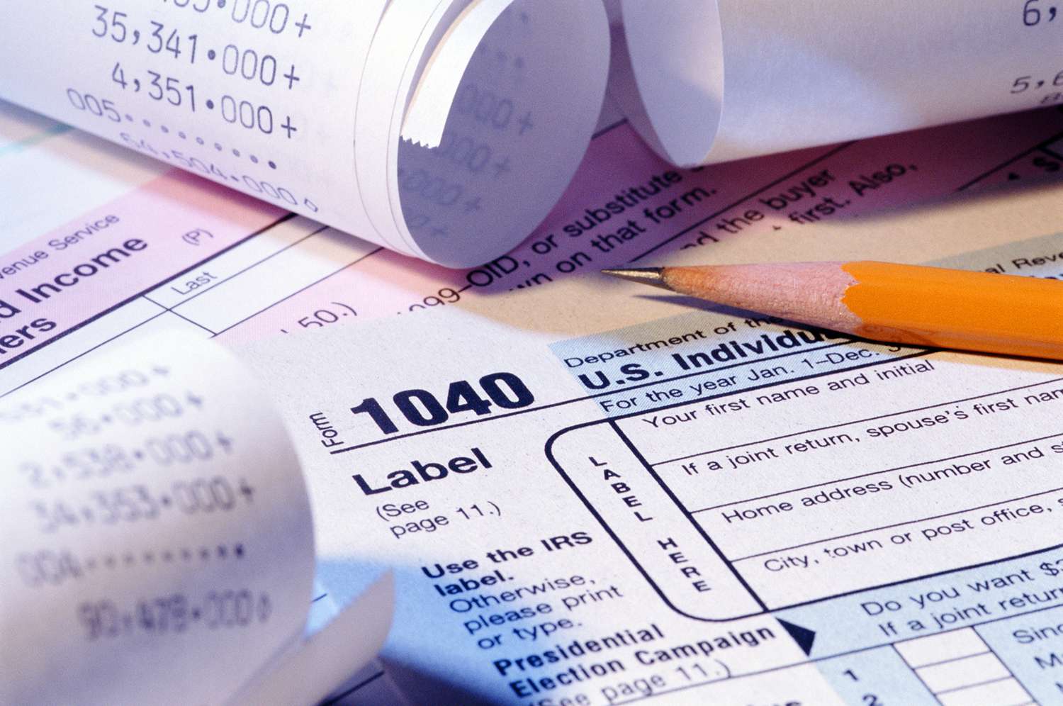 Tax Forms, Pencil and Receipts