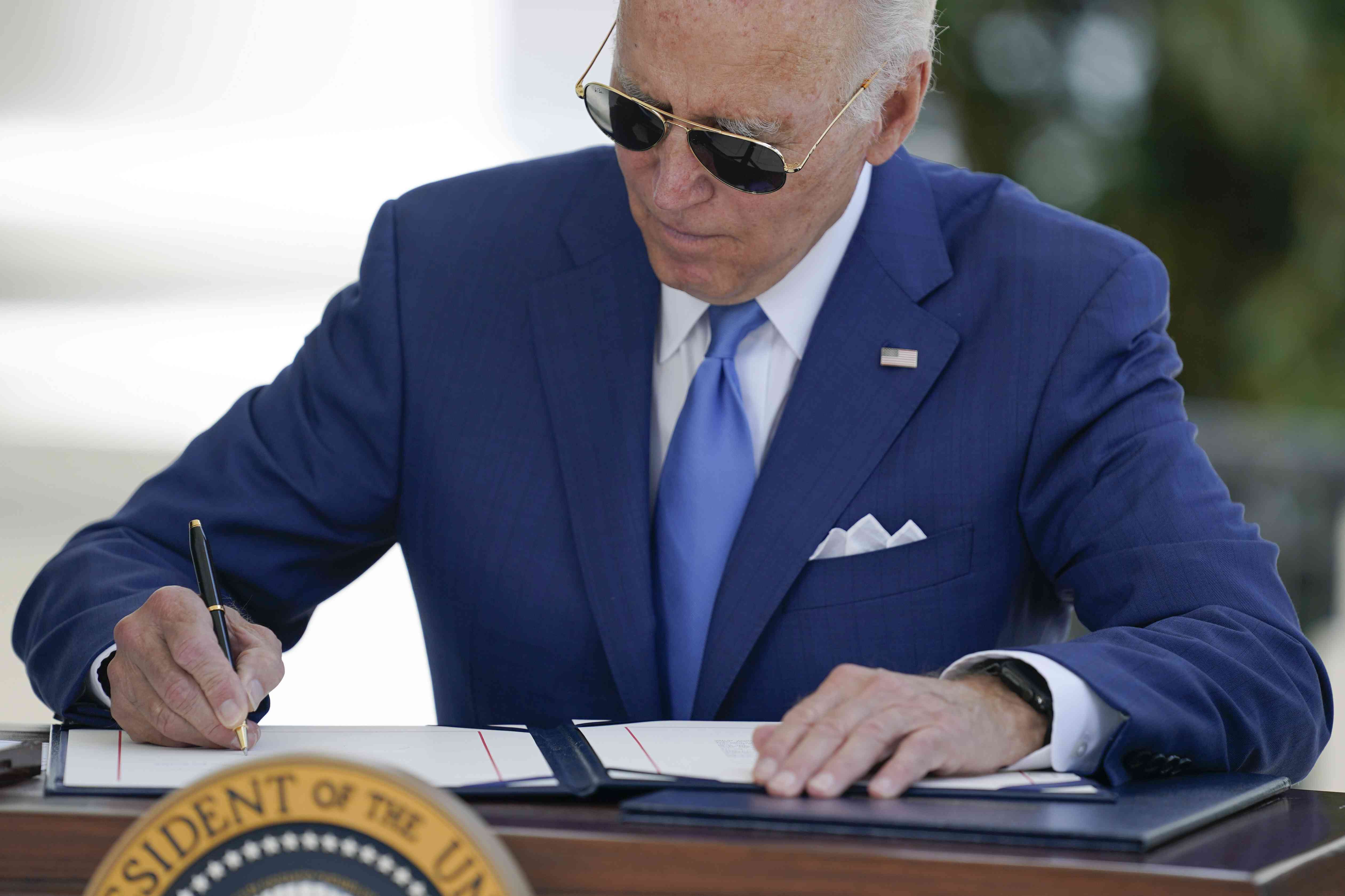 President Joe Biden Signing Paperwork