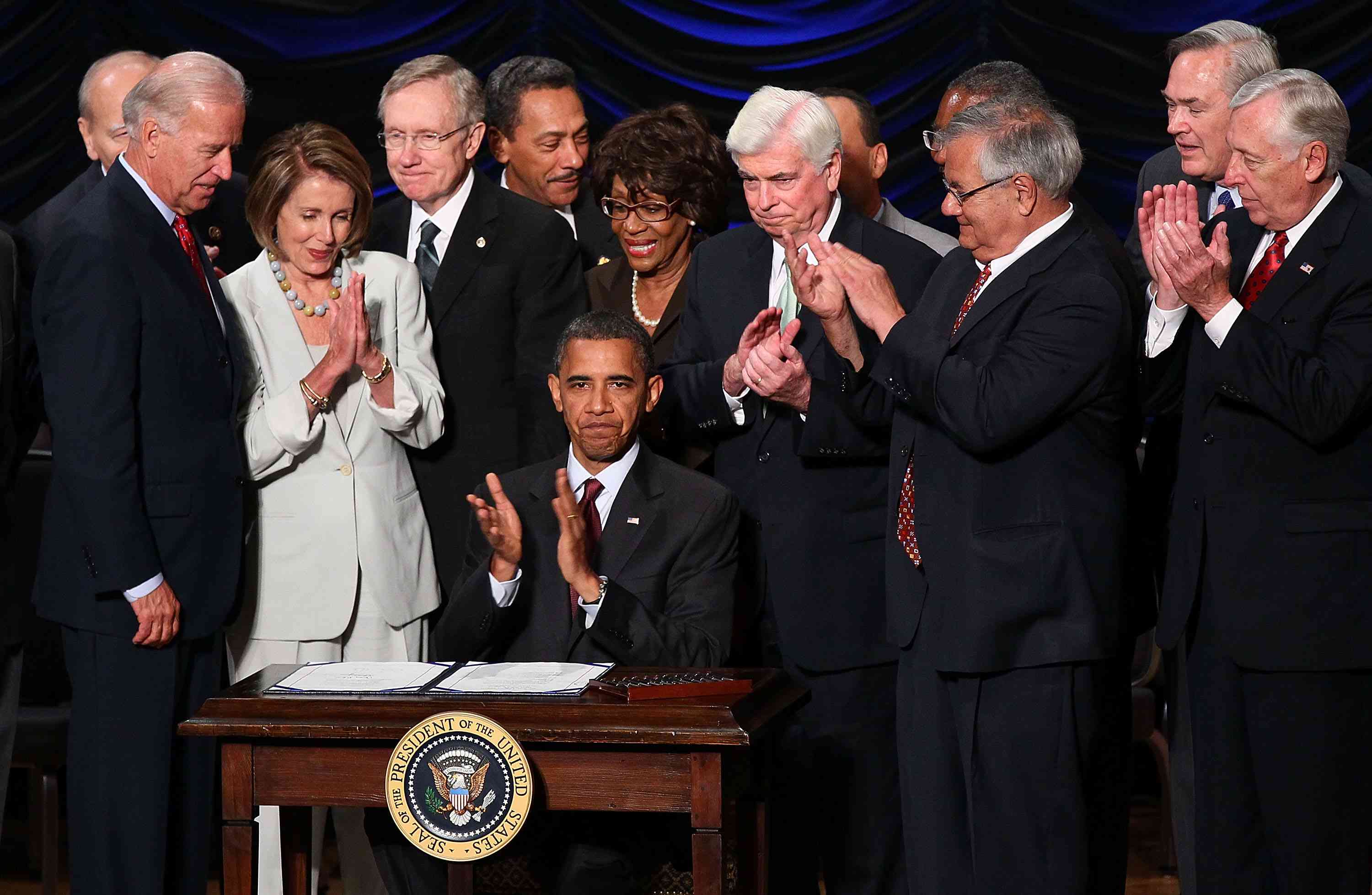 U.S. President Barack Obama signs the Dodd-Frank Wall Street Reform and Consumer Protection Act