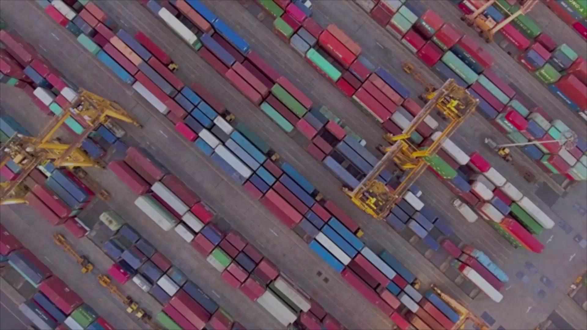 Overhead shot of shipping containers in a shipyard