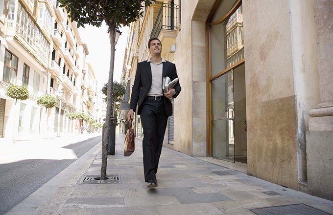Man with briefcase on elegant street